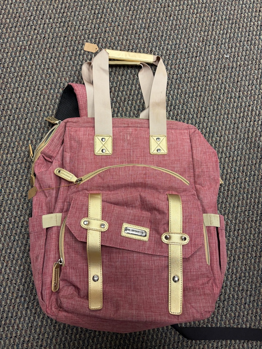 Structured Pink Backpack with Gold Accents for Women